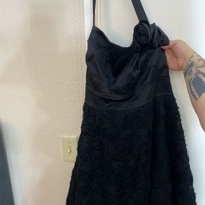 Knee length black cocktail dress. Slight wear on armpits/ only worn twice